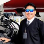 ## Air India Crash Pilot’s Father Vows to Defend Son’s Reputation The father of Capt Sumeet Sabharwal, one of the pilots who died in the Air India Flight 171 crash, has promised to continue defending his son's reputation as investigators prepare to release another update on the tragedy. Pushkar Raj Sabharwal said he remains determined to protect his son's name from speculation and unverified claims. "My son is no longer here, but I must defend his reputation," he said. ## Family Faces Painful Speculation Capt Sumeet Sabharwal served as the senior pilot on Air India Flight 171. The London-bound Boeing 787 Dreamliner crashed just seconds after taking off from Ahmedabad on June 12, 2025. The disaster claimed at least 260 lives, including 241 passengers and crew members on board. It became one of India's deadliest aviation accidents in recent years. Since the crash, the Sabharwal family has faced intense public attention. Media reports and online discussions have added to their grief while the investigation remains unfinished. ## Investigation Continues Without Final Conclusion Authorities have not yet determined the exact cause of the crash. A preliminary investigation report revealed that the fuel control switches for both engines moved from the "run" position to the "cut-off" position shortly after take-off. As a result, both engines lost fuel supply during a critical stage of the flight. Cockpit recordings captured a conversation between the two pilots. One pilot questioned why the fuel had been cut off, while the other denied taking that action. Investigators did not identify which pilot made either statement. They also found no evidence that either pilot intentionally caused the incident. ## Reports Shifted Attention Toward Senior Pilot Several international media reports later suggested that investigators were paying closer attention to Capt Sabharwal's role in the cockpit. According to those reports, cockpit audio recordings appeared to support the theory that the captain may have cut fuel flow to the engines. However, officials have not confirmed those claims. Pilot associations across India strongly rejected the speculation. Industry groups argued that media outlets should avoid drawing conclusions before investigators complete their work. ## Authorities Urge Caution India's Aircraft Accident Investigation Bureau criticized selective and unverified reporting surrounding the crash. The agency warned that premature conclusions could mislead the public and undermine the investigation process. Officials stressed that investigators had not assigned blame to either pilot. Capt Sabharwal's father later approached India's Supreme Court and requested an independent investigation into all possible causes of the accident. During proceedings, the court noted that the preliminary findings did not place responsibility on the senior pilot. The judges stated that no evidence in the initial report suggested fault on his part. ## Family Awaits Final Answers As investigators continue their work, the Sabharwal family hopes the final report will provide clear answers about what happened that day. For Pushkar Raj Sabharwal, the goal remains simple. He wants the public to remember his son as a respected professional pilot and wait for verified facts before making judgments. The upcoming investigation update may provide new insights into one of the most tragic aviation disasters in recent history.