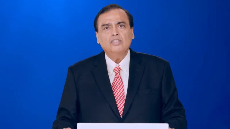 Jio Platforms Moves Toward Major IPO Mukesh Ambani’s Jio Platforms, part of Reliance Industries, has moved closer to launching a public share sale. The company board has approved a draft prospectus for an initial public offering. Ambani shared this development during Reliance’s annual shareholder meeting. Market reports suggest the IPO could raise around four billion dollars. Jio already serves more than five hundred million users, making it India’s largest telecom operator. Strong Market Attention on the Listing Investors are closely tracking the IPO because it may show how much demand exists for new listings in India’s stock market. Analysts view this move as a key test after recent market fluctuations. A strong response could support more large company listings in the future. Ambani said the listing would show that India can build large scale technology companies with global reach and value. Growth From Telecom to Technology Powerhouse Jio launched in 2016 with low cost mobile data plans. The strategy quickly disrupted India’s telecom sector and attracted millions of users in a short time. Since then, the company has expanded beyond telecom services. It now works in cloud computing, enterprise solutions, and artificial intelligence. This expansion has helped Jio move from a telecom provider to a broader digital infrastructure company. Global Partnerships and Expansion Jio and Bharti Airtel both signed agreements with SpaceX to bring Starlink internet services to India. This step signals growing interest in satellite based connectivity across the country. Earlier this month, Meta also announced plans to use capacity from a new AI focused data center being developed by Reliance in Gujarat. The facility is expected to support large scale computing demand. Impact on India’s Capital Markets The Jio IPO comes shortly after the National Stock Exchange filed documents for its own public listing. That IPO may raise more than three billion dollars if it proceeds as expected. Together, these listings could become some of the largest in India in recent years, similar to major global share offerings seen in the automotive sector. Market experts say Jio’s performance after listing will influence investor confidence in upcoming IPOs. What Investors Are Watching Jio’s listing has gained attention because of its scale, user base, and fast growth in digital services. Investors will focus on valuation, pricing, and demand during the offer period. A strong debut could increase activity in India’s IPO market. A weaker response may slow down upcoming listings.