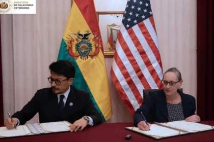 Bolivia and US sign $20 million drug trafficking cooperation deal New agreement to fight drug networks Bolivia has agreed a new security partnership with the United States worth up to $20 million. The funding will support training and equipment for Bolivian forces working against drug trafficking and organised crime. The deal marks a clear shift in relations between the two countries after nearly two decades of limited cooperation. Shift in Bolivia US relations Relations changed significantly after former President Evo Morales removed the US Drug Enforcement Administration from Bolivia 18 years ago. Bolivia is still one of the world’s main producers of coca leaves, which are used to make cocaine. Under President Rodrigo Paz, ties with Washington are now improving. Bolivia has also joined the US led “Shield of the Americas” security initiative focused on regional crime and drug networks. Training and security support The US embassy confirmed it will work closely with Bolivia to provide training, equipment, and wider support for law enforcement. The Bolivian foreign ministry said the goal is to strengthen institutions responsible for public security, investigations, and tackling organised crime. The agreement was signed in La Paz shortly after Bolivia appointed Ernesto Justiniano as defence minister, who previously served as the country’s drug czar. Regional cooperation and political support Earlier this year, President Paz attended the first Shield of the Americas summit in Florida, hosted by US President Donald Trump, along with other regional leaders. The alliance has publicly supported Paz during recent political unrest in Bolivia. In May, member countries expressed concern over protests and road blockades, saying they aimed to destabilise the elected government.