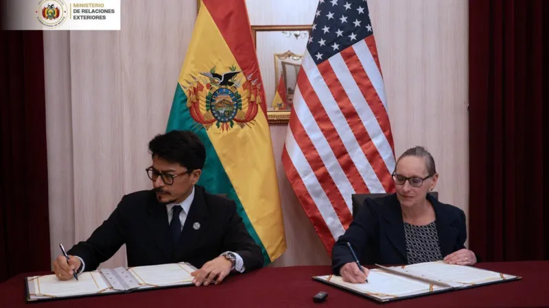 Bolivia and US sign $20 million drug trafficking cooperation deal New agreement to fight drug networks Bolivia has agreed a new security partnership with the United States worth up to $20 million. The funding will support training and equipment for Bolivian forces working against drug trafficking and organised crime. The deal marks a clear shift in relations between the two countries after nearly two decades of limited cooperation. Shift in Bolivia US relations Relations changed significantly after former President Evo Morales removed the US Drug Enforcement Administration from Bolivia 18 years ago. Bolivia is still one of the world’s main producers of coca leaves, which are used to make cocaine. Under President Rodrigo Paz, ties with Washington are now improving. Bolivia has also joined the US led “Shield of the Americas” security initiative focused on regional crime and drug networks. Training and security support The US embassy confirmed it will work closely with Bolivia to provide training, equipment, and wider support for law enforcement. The Bolivian foreign ministry said the goal is to strengthen institutions responsible for public security, investigations, and tackling organised crime. The agreement was signed in La Paz shortly after Bolivia appointed Ernesto Justiniano as defence minister, who previously served as the country’s drug czar. Regional cooperation and political support Earlier this year, President Paz attended the first Shield of the Americas summit in Florida, hosted by US President Donald Trump, along with other regional leaders. The alliance has publicly supported Paz during recent political unrest in Bolivia. In May, member countries expressed concern over protests and road blockades, saying they aimed to destabilise the elected government.