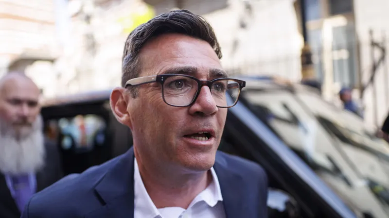 # Andy Burnham Could Become UK Prime Minister Within Weeks Under Labour Leadership Timetable Labour has announced a fast-track schedule to elect its next leader following Sir Keir Starmer's resignation. The timetable could allow Andy Burnham to become both Labour leader and prime minister as early as 17 July. Burnham currently appears to be the strongest candidate in the race. If no other Labour MP secures enough support to challenge him, he could take over leadership within a matter of weeks. ## Labour Unveils Leadership Election Schedule Labour's governing body has outlined the process for selecting the party's next leader. Candidates can begin collecting MP nominations on 9 July and must reach the required threshold by 15 July. Those who qualify must then secure support from affiliated organizations, including trade unions, by 16 July. If only one candidate meets all requirements, Labour will announce the new leader at a special party conference on 17 July. Following that announcement, the King would formally appoint the new prime minister. ## Membership Vote Possible if More Candidates Enter The situation could change if additional candidates enter the contest and secure enough backing. In that case, Labour members and affiliated supporters would vote between 6 August and 27 August. The party would then announce the final result on 29 August. At present, Burnham remains the only confirmed candidate, which strengthens the possibility of an early leadership transition. ## Burnham Gains Strong Support Across Labour Burnham declared his intention to run shortly after Sir Keir stepped down on Monday. Several prominent Labour figures have already endorsed his campaign. Supporters include Chancellor Rachel Reeves, Foreign Secretary Yvette Cooper, Education Secretary Bridget Phillipson, and Health Secretary James Murray. Former Health Secretary Wes Streeting also decided not to run and instead backed Burnham's bid for the leadership. Meanwhile, Darren Jones has ruled out entering the race. Former Armed Forces minister Al Carns has not yet confirmed whether he plans to stand. Political observers believe Burnham may attract enough nominations to prevent any rival candidate from reaching the required threshold. ## Starmer Seeks Smooth Transfer of Power Although Sir Keir Starmer has announced his resignation, he will remain prime minister until Labour elects a new leader. He has emphasized the importance of an orderly transition and has authorized civil servants to meet potential leadership candidates. These meetings aim to help candidates prepare for the responsibilities of government. Government officials have rejected suggestions that the administration has become ineffective during the transition period. They insist ministers continue to carry out their duties while the leadership contest unfolds. ## What Happens Next? The coming weeks will determine whether Burnham faces competition or secures an uncontested victory. If no challenger emerges, Labour could install a new leader and prime minister on 17 July. If the race becomes contested, party members will have the final say in August. For now, Burnham remains the clear favorite to lead Labour into its next chapter.