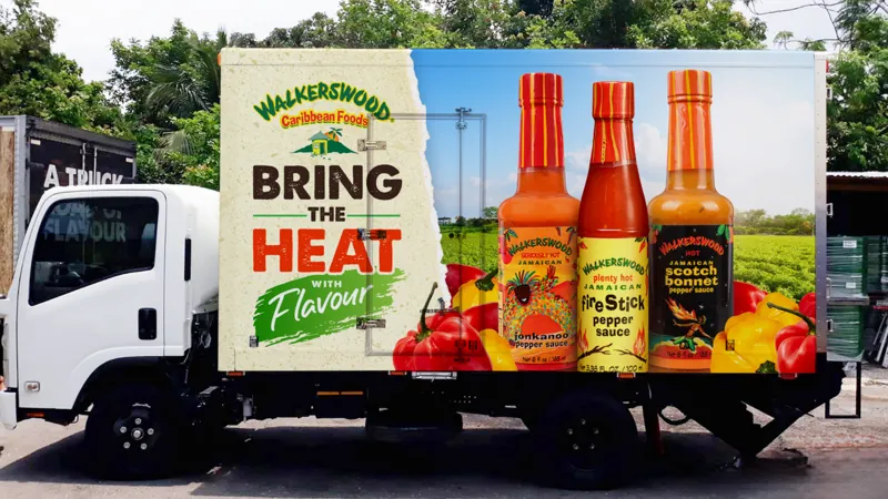 Caribbean Hot Sauce Industry Hit by Scotch Bonnet Pepper Shortage Key Ingredient Under Pressure Hot sauce is a daily essential across Caribbean households. Scotch bonnet peppers give it the signature heat found in meals like rice and peas, curries, and stews. Demand for Caribbean hot sauce has also grown internationally. These products now appear in major supermarkets in the United States, United Kingdom, and Australia. However, producers are now struggling to keep up with supply because the main ingredient is becoming harder to source. Weather Damage Disrupts Farming Farmers in Jamaica, a major Scotch bonnet producing country, have faced repeated setbacks from extreme weather. Recent hurricanes caused serious damage to farmland and crops. Heavy rainfall also affected plant growth and reduced pepper quality. In some cases, excess rain reduced the heat level of the peppers, which directly impacts sauce flavour. Farmers also deal with plant diseases and pests that weaken harvests and reduce yields. Because of these combined pressures, production has dropped and supply has tightened. Farmers Switch Crops for Stability Many farmers have reduced Scotch bonnet cultivation after repeated losses. Some have shifted to crops like sweet potatoes because they are more stable and offer better financial security. This shift has reduced the overall supply of Scotch bonnet peppers even further, making it harder for sauce manufacturers to maintain production levels. Rising Prices and Supply Challenges Hot sauce manufacturers report major cost increases due to limited pepper availability. Some producers say pepper prices rose sharply after major storms, with increases reaching around 10 times in the short term. Over the last two years, costs have climbed by roughly 40 to 50 percent. Companies that rely heavily on exports have also been forced to cancel orders when supply runs low. To manage shortages, some businesses are increasing storage of peppers throughout the year. This helps reduce sudden supply gaps but adds extra cost and risk. Cultural Importance and Industry Impact Scotch bonnet peppers hold strong cultural value in Jamaica and across the Caribbean. They are used in nearly every type of local cooking and are a core part of national identity. Hot sauce producers say demand remains strong both locally and abroad, but supply instability is now their biggest challenge. As climate conditions continue to change, the industry faces ongoing uncertainty about future harvests and pricing stability.