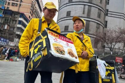 China cracks down on “ghost kitchens” in food delivery industry Authorities target fake listings and unsafe food practices China has launched a strong crackdown on so called “ghost kitchens” in its fast growing food delivery market. These are online restaurants that appear on apps but have no real physical presence. Instead of running proper kitchens, they often outsource orders to third party vendors that cook and dispatch food at lower costs. Officials say this system has helped some sellers cut prices and increase profits. However, it has also raised serious concerns about food safety and misleading customers. Millions of orders linked to hidden supply chains Investigations have uncovered large scale misuse across major delivery platforms. In one case, a cake business listed hundreds of locations online but reportedly did not operate a single real store. Authorities also found that many orders were passed between multiple platforms before being completed by outside vendors. According to state reported figures, millions of orders were processed through these indirect systems. Regulators also identified tens of thousands of fake or unverified restaurant listings across major apps. Pressure builds on delivery platforms Food delivery companies have come under scrutiny for allowing these listings to grow. Officials say some platforms relaxed checks to avoid losing sellers to competitors. This competition has fueled a price war in the industry, pushing profits lower and increasing pressure on delivery riders who work under tight deadlines. In response, regulators have already fined several major e commerce platforms for violations linked to fake restaurant listings and unsafe delivery practices. New rules tighten verification Authorities have introduced stricter requirements for food delivery apps. Platforms must now verify restaurant licenses, confirm physical addresses, and ensure online listings match real businesses. Sellers must also clearly state whether they operate dine in services or only delivery. Tech driven monitoring and public reporting To improve food safety, some cities have started using live kitchen monitoring systems. A number of food stalls have installed transparent kitchen setups where customers can watch food preparation in real time. In addition, officials are working with major platforms to use AI based systems to detect suspicious listings. Delivery riders are also being encouraged to report illegal or fake restaurants. Industry impact The crackdown highlights growing concerns about safety and transparency in China’s food delivery sector. While low prices have driven rapid growth, authorities are now focusing on cleaning up hidden supply chains and restoring trust in online food services.