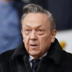 Safeguarding Investigation Begins A safeguarding investigation was launched in 2023 after allegations were raised about the conduct of David Sullivan. The concerns triggered action from football authorities and local safeguarding officials. The case involved coordination between the club, the Football Association, and the local authority to assess the situation and implement protective measures. Restrictions on Women’s and Youth Teams Following the investigation, a safeguarding decision was made to restrict Sullivan’s access to sensitive areas of the club. He was banned from contacting West Ham United women’s team and youth teams. He was also stopped from attending their matches. These measures were introduced to protect players and staff while the investigation was reviewed. Ongoing Ban and Limited Access The restrictions have remained active since 2023. Sullivan has continued to be barred from involvement with the women’s and youth sides of the club. At the same time, he was still seen around the men’s team fixtures at the London Stadium during this period. West Ham and the Football Association have both stated that they maintain strong safeguarding systems. They also said they cannot comment on individual cases. Resignation and Allegations Sullivan later stepped down from his leadership roles at the club. He remains its largest shareholder. He has denied all allegations against him. He described them as false and linked to long standing claims about his private life. He also said the process has been unfair and that he intends to challenge the accusations. Multiple women have made claims involving abuse of power and misconduct. These claims are part of the wider investigation being reported by media outlets. Club and Authority Position Football authorities and the club have kept details limited due to confidentiality rules. However, they confirmed that safeguarding decisions were taken through official procedures. The aim of these measures is to protect players, staff, and club operations while investigations are ongoing.
