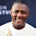 Idris Elba on James Bond Casting and “Woke” Debate: Full Summary Idris Elba speaks on James Bond role and global audience reaction British actor Sir Idris Elba has shared his thoughts on the ongoing debate around the future of James Bond. He said the character should stay true to its original identity and warned against changing it in ways that could divide audiences. Elba also addressed long running speculation linking him to the role of 007, saying he has never been officially in the running, even though he feels flattered by the attention. He explained that James Bond has a specific legacy and tone, and that this should not be altered too much. According to him, the franchise is built on escapism, and changing its core identity to match modern debates could take away from what makes it popular worldwide. Elba comments on diversity and audience expectations Elba pointed out that global audiences react differently to casting choices. He suggested that some viewers may not accept a Black actor in the role of James Bond, especially in certain regions. While expressing this view, he emphasized that Bond is a fictional character and should remain consistent with how it was originally created. He also said that trying to adjust the character to fit every cultural expectation could weaken the story. Instead, he believes the focus should remain on maintaining the traditional style of the franchise. “Man at Arms” role and casting humor Elba is currently appearing in a new project where he plays Man at Arms from Masters of the Universe. He joked about the contrast between his real appearance and the animated character, noting that the role shows how flexible casting can be in fantasy worlds. He highlighted that fictional characters can be reimagined more freely than grounded roles like James Bond. James Bond franchise continues search for new actor The search for the next James Bond is officially underway after years of speculation following Daniel Craig’s departure in No Time To Die. Production insiders confirm that casting auditions are ongoing, although details remain private. The next Bond film will be directed by Denis Villeneuve and written by Steven Knight. Industry reports suggest casting director Nina Gold is leading the selection process. Several well known actors are rumored to be in consideration, including Callum Turner, Henry Cavill, and Aaron Taylor Johnson.