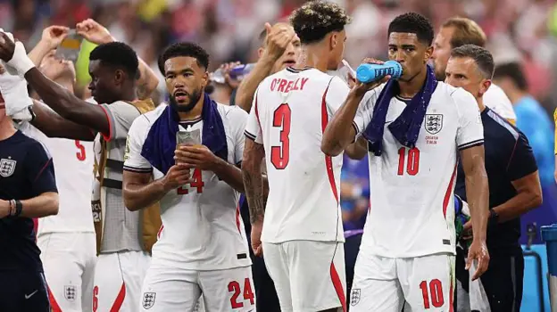 Fans Split Over World Cup Hydration Breaks After England Beat Croatia Strong start for England in Dallas England opened their 2026 FIFA World Cup campaign with a 4 to 2 win over Croatia. The match took place in Dallas and delivered plenty of action, but the biggest talking point came off the ball. England national football team showed strong form. Croatia national football team also pushed hard during the game, keeping the contest lively from start to finish. Hydration breaks spark debate Two hydration breaks were taken during the match. Each break lasted around three minutes, one in each half. Officials introduced these pauses to protect players from extreme heat across North America. They are meant to support recovery in tough weather conditions. However, many fans inside the stadium reacted negatively. Some booed during the stoppages, showing clear frustration with the interruptions. Fans question timing and purpose Some supporters felt the breaks were unnecessary in an air conditioned stadium. They argued that conditions inside the venue did not justify stopping the game twice. Others said the breaks interrupt the flow of football. They believe the rhythm of the match suffers when play is paused too often. A section of fans also suggested that broadcasters may benefit from extra advertising time during these breaks. This added to the criticism around the decision. Safety versus entertainment Not all opinions were negative. Some fans accepted that extreme heat in certain locations makes hydration breaks necessary. They pointed out that player safety should come first in harsh weather. Still, the main concern remains balance. Fans want protection for players, but they also want the game to stay fast and continuous. Bigger conversation in modern football The situation in Dallas reflects a wider debate in football today. Organizers must balance player welfare, broadcast demands, and fan experience. Hydration breaks may stay part of the tournament, but opinions around them remain divided.