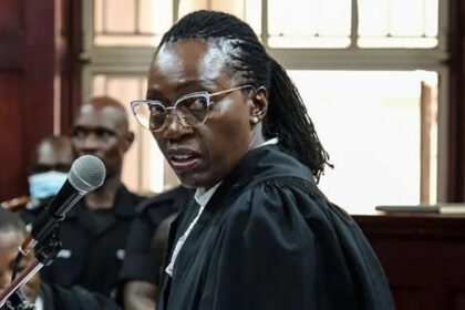 Former Kenyan Justice Minister and senior lawyer Martha Karua has accused Ugandan authorities of unlawfully preventing her from entering the country. The incident happened when she arrived at Entebbe International Airport to join a legal team representing opposition figures facing treason-related charges. Karua had traveled to Uganda to support her colleague, lawyer Erias Lukwago, in the defense of opposition leader Kizza Besigye. Besigye is currently facing treason charges in a case that has attracted significant public and political attention. According to reports, immigration officials stopped Karua upon arrival and instructed her to return to Kenya. Authorities did not provide a public explanation for the decision. ## Karua Calls the Decision Politically Motivated After returning to Nairobi, Karua criticized the move and described it as unlawful and politically motivated. She argued that citizens of East African Community member states should be able to move freely within the region. Karua also stated that officials informed her she was considered persona non grata in Uganda. However, no official statement has been released by Ugandan authorities to confirm or explain that designation. Her exclusion has raised questions about regional cooperation and the treatment of legal professionals involved in politically sensitive cases. ## Different Treatment for Members of the Same Legal Team The situation drew additional attention because Kenya Law Society President Charles Kanjama, who traveled with Karua, was allowed to enter Uganda without any restrictions. Kanjama expressed concern over the differing treatment of members of the same legal team. He noted that both lawyers traveled for the same case and intended to perform similar professional duties. He called on Ugandan authorities to provide a clear explanation for the decision. According to Kanjama, it is difficult to understand why one lawyer was admitted while another was denied entry under the same circumstances. ## Concerns Grow Over Political Freedoms in East Africa The incident has fueled debate about political freedoms, legal independence, and the rights of opposition figures across East Africa. Critics argue that restricting access to legal representation can undermine confidence in judicial processes. Meanwhile, Ugandan immigration authorities have not publicly commented on the matter. The lack of an official explanation continues to generate discussion among legal experts and civil society groups. As attention remains focused on the ongoing treason cases, many observers are calling for greater transparency regarding the decision to block Martha Karua from entering Uganda.