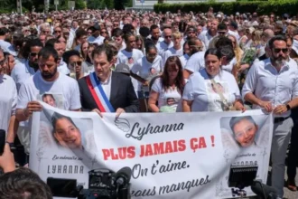 Funeral held in Fleurance as community grieves An 11 year old girl, Lyhanna, was laid to rest in the town of Fleurance in south western France. Family, friends, and local residents attended the funeral to pay their final respects. The town showed public support with flags lowered at local institutions. Public anger grows over missed warnings The case has triggered strong public reaction across the region. Many residents are questioning how authorities handled earlier warnings linked to the suspected attacker. Officials had been alerted months before the killing about allegations involving the main suspect, Jérôme Barella. However, no formal questioning took place at that time. Separate intelligence reports also suggested possible concerning online activity. That information was reviewed but later treated as low priority. Investigation expands to suspect’s family The investigation has widened beyond the main suspect. Authorities have placed his brother under investigation following rape allegations made by two women, including one who was underage at the time of the alleged incident. He denies the claims. The suspect’s father is also under investigation in a separate case involving historical abuse allegations. He has denied all accusations. Case raises questions about police response Lyhanna disappeared after being seen leaving school with the suspect’s daughter. Her body was later found on a nearby farm after a search operation. The case has now become a wider national concern. Critics are questioning why earlier reports were not acted on more quickly and why multiple warnings did not lead to stronger preventive action.