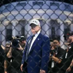 Federal investigators say they stopped a planned attack targeting a UFC event held at the White House. The plan allegedly involved drones loaded with explosives and a coordinated sniper setup aimed at creating panic during the large public gathering. Officials say the attack was intended to unfold in stages. The first step involved drone strikes near surrounding buildings. The second phase allegedly included snipers targeting people as crowds moved away in confusion. A final group would then try to enter secure areas near the White House. How Investigators Uncovered It Authorities discovered the plan through digital surveillance and intercepted communications. One key suspect was arrested in Ohio. Investigators accessed encrypted messages that linked him to other individuals involved in the planning. His mother reportedly alerted local authorities after noticing suspicious online activity and large firearms purchases. This tip helped law enforcement move quickly before the event took place. Suspects and Arrests Five people are now in custody according to officials. The arrests took place across several locations in the United States as part of a coordinated law enforcement operation. One suspect faces charges including conspiracy against the United States and attempted violence against a federal officer. Officials say more suspects may still be under investigation as the case develops. Online Activity and Motives Investigators say the group formed online earlier in 2026 through a social media chat group. Communication later moved to an encrypted messaging platform. Prosecutors describe the group as influenced by extreme ideological views and anti government sentiment. Messages referenced political grievances and broader frustrations about national issues. Officials say members discussed targeting high profile figures attending public events. Authorities also say the group spoke about triggering broader unrest through coordinated violence. Security Response and Investigation Security agencies worked together to stop the plan before any attack could occur. Officials described the situation as a serious threat but confirmed the event proceeded safely with strong protection measures in place. Investigations remain active. Authorities say additional suspects are still being tracked, and the case may expand as more digital evidence is analyzed.