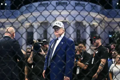 Federal investigators say they stopped a planned attack targeting a UFC event held at the White House. The plan allegedly involved drones loaded with explosives and a coordinated sniper setup aimed at creating panic during the large public gathering. Officials say the attack was intended to unfold in stages. The first step involved drone strikes near surrounding buildings. The second phase allegedly included snipers targeting people as crowds moved away in confusion. A final group would then try to enter secure areas near the White House. How Investigators Uncovered It Authorities discovered the plan through digital surveillance and intercepted communications. One key suspect was arrested in Ohio. Investigators accessed encrypted messages that linked him to other individuals involved in the planning. His mother reportedly alerted local authorities after noticing suspicious online activity and large firearms purchases. This tip helped law enforcement move quickly before the event took place. Suspects and Arrests Five people are now in custody according to officials. The arrests took place across several locations in the United States as part of a coordinated law enforcement operation. One suspect faces charges including conspiracy against the United States and attempted violence against a federal officer. Officials say more suspects may still be under investigation as the case develops. Online Activity and Motives Investigators say the group formed online earlier in 2026 through a social media chat group. Communication later moved to an encrypted messaging platform. Prosecutors describe the group as influenced by extreme ideological views and anti government sentiment. Messages referenced political grievances and broader frustrations about national issues. Officials say members discussed targeting high profile figures attending public events. Authorities also say the group spoke about triggering broader unrest through coordinated violence. Security Response and Investigation Security agencies worked together to stop the plan before any attack could occur. Officials described the situation as a serious threat but confirmed the event proceeded safely with strong protection measures in place. Investigations remain active. Authorities say additional suspects are still being tracked, and the case may expand as more digital evidence is analyzed.