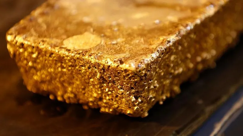 # Guinea Bans Raw Gold Exports to Strengthen Local Refining Industry Guinea has officially stopped the export of unrefined gold as part of a new strategy to strengthen its mining sector and increase economic growth. The government wants more gold to be processed inside the country before it reaches international markets. President Mamadi Doumbouya announced the decision after meeting with industrial and artisanal gold producers, traders, and buyers. The policy took effect immediately and aims to create jobs, increase revenue, and keep more value within Guinea's economy. ## Guinea Focuses on Local Gold Processing President Doumbouya said Guinea can no longer allow other countries to benefit from processing its raw materials. According to him, gold mined in Guinea should be refined locally before export. The government believes local processing will generate more employment opportunities and support industrial development. It also expects the move to increase earnings from the country's gold sector. ## New Refinery Near Completion in Conakry To support the new policy, Guinea is preparing to launch a major gold refinery in the capital city, Conakry. The facility is close to completion and will process gold produced across the country. Reports indicate the refinery can handle up to 250 tonnes of gold annually. This capacity is more than enough to process Guinea's current production levels. Authorities reported that Guinea exported over 22 tonnes of gold during the first quarter of this year. Once the refinery becomes fully operational, that gold will be processed domestically before reaching foreign markets. ## Mining Companies Face Strict Rules The government has warned mining companies and gold traders to follow the new regulations. Officials stated that companies violating the export ban could lose their operating licenses. Authorities may also terminate mining contracts if firms fail to comply with the directive. The government hopes these strict measures will ensure the success of the policy. ## Growing Trend Across Africa Guinea is not the first African country to introduce such reforms. Several nations have already taken steps to increase local processing of minerals and metals. Tanzania and Uganda currently ban the export of unprocessed minerals, including gold and copper. Ghana also plans to prohibit raw gold exports by 2030. Meanwhile, Zimbabwe, Africa's leading lithium producer, will ban lithium concentrate exports from 2027. The country aims to expand its battery materials industry and retain more economic value at home. ## Guinea's Important Role in Global Mining Guinea ranks as Africa's sixth largest gold producer, according to the World Gold Council. The country also holds the position of the world's largest producer of bauxite, the key raw material used to manufacture aluminium. With the new gold export policy, Guinea hopes to strengthen its industrial base, attract investment, and maximize profits from its natural resources. The move marks a significant step in the country's effort to build a stronger and more self-sufficient economy.