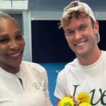 Serena Williams continued her comeback training in London, even though heavy rain disrupted grass court practice. Her British hitting partner David Quayle helped arrange indoor courts so she could keep training without interruption. He secured sessions at top venues like the Hurlingham Club and the National Tennis Centre. These indoor setups allowed her to stay consistent with her preparation despite the weather challenges. High Level Performance Still Intact Quayle said Serena is still playing at a very high level. He praised her focus and said she has not lost her sharp edge on court. He described her as extremely professional in every session. According to him, her standards remain the same as during her peak years. Facing a Tennis Legend on Court Quayle admitted the first training sessions felt intense. He had watched Serena on television for years, so facing her serve in real time felt different. He said he had to adjust quickly because her shots demanded full concentration. While he admired her skill, he also needed to stay focused during rallies. Her presence on court created pressure at first. Over time, he became more comfortable playing across the net from her. Supportive Training Environment Quayle also said Serena’s team encourages open communication. He is allowed to share feedback during practice, which helps improve training quality. He described the team environment as friendly and easy to work in. Most of their time is spent on court or in training sessions. Off the court, the focus remains on preparation. However, he said Serena is welcoming and often jokes with the team. Upcoming Schedule and Future Plans Quayle is expected to travel to Berlin for Serena’s next tournament, where a new hitting partner has not yet been confirmed. He is also unsure whether she will play at Wimbledon. Still, he is no longer required to keep her training schedule secret. He said he now feels more relaxed since the comeback has been made public.
