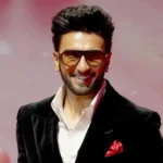 Indian Film Workers Union Withdraws Boycott Against Ranveer Singh Over Don 3 Exit Background of the Dispute A major film workers body in India has pulled back its call to stop members from working with Ranveer Singh after controversy surrounding his reported exit from the film Don 3. The Federation of Western India Cine Employees raised concerns last month after producers said Singh left the project only weeks before an overseas shoot was set to begin. The decision led to tension across the industry, as the film had already entered an advanced stage of preparation. Why the Boycott Was Announced Producers of Don 3 claimed that Singh’s sudden departure caused major disruption and financial strain. Reports suggest around 450 million rupees were spent on early production work before filming was paused. After these complaints, the film workers union asked its members not to collaborate with Singh until he clarified his position. Legal Pressure and Industry Response The situation escalated when Singh reportedly sent a legal notice to the union. The union later confirmed it would respond through its legal team. Shortly after, senior figures in the industry stepped in. Federation president BN Tiwari publicly supported Singh and said the wider film community stood with him. Industry adviser Ashoke Pandit also encouraged dialogue and suggested a direct meeting to resolve the issue. Don Franchise Legacy The Don series remains one of Bollywood’s most iconic action franchises. It began with superstar Amitabh Bachchan in 1978 and was later rebooted by Shah Rukh Khan under the direction of Farhan Akhtar. The upcoming installment starring Singh was expected to continue this legacy. Current Position of the Union The Federation of Western India Cine Employees later withdrew its informal boycott call. Officials said they do not have the authority to ban any artist and expressed hope for a positive resolution. The union also noted that several industry groups requested the withdrawal of the directive. Singh’s Response and Career Context Singh has not spoken publicly about the matter. His team previously said he respects the Don franchise and the wider film industry and chose to remain silent during the dispute. He remains one of India’s leading stars, with major films including Padmaavat and Gully Boy, along with recent commercial successes. Rare Industry Action Such public boycott calls against major film stars are uncommon. The union has previously issued similar directives in other politically sensitive situations involving cross border collaborations and casting disputes.
