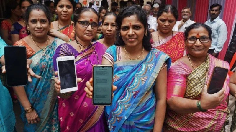 # India’s Cash Transfer Programs Offer Relief but Put Pressure on State Finances India is increasingly relying on direct cash transfer programs to support low income families and reduce poverty. Over the last decade, these welfare schemes have become an important source of financial support for women, farmers, and unemployed youth across the country. Government spending on cash transfer initiatives has increased dramatically. Data from ProjectDEEP shows that funding has grown from less than $2 billion in 2015 to almost $30 billion today. These programs now account for nearly 1% of India’s gross domestic product and more than 10% of total social sector spending. The expansion has been rapid. In 2019, only four Indian states offered regular cash transfer programs. Today, 17 states and the federal territory of Delhi provide monthly payments to eligible citizens. Supporters say these programs help families manage rising living costs and economic uncertainty. Monthly payments generally range between 1,000 and 2,500 rupees, depending on the state. According to recent research, a typical transfer of 1,500 rupees can cover a large share of monthly expenses for low income households. ## Cash Transfers Strengthen Household Spending Economic experts believe these payments help maintain household consumption, especially during periods of inflation and economic pressure. Rising energy costs and weather related challenges continue to affect many families, particularly those dependent on agriculture. For poorer households, the additional income provides financial stability and helps cover essential expenses such as food, transportation, education, and healthcare. ## Growing Support for Unemployed Youth Several state governments have also introduced programs aimed at unemployed young people. Around 10 states now provide financial assistance to job seekers, with many of these initiatives launched during the past three years. Experts say these payments act as temporary support while young people search for employment. This has become increasingly important as technological changes and climate related disruptions create uncertainty in the job market. ## Concerns Over Rising Government Spending Despite their benefits, economists and policymakers remain concerned about the growing cost of these programs. India’s Economic Survey has identified cash transfer schemes as a major factor behind fiscal pressure in several states. Many states running these welfare programs already face revenue deficits, raising questions about their long term sustainability. While the schemes provide immediate relief to vulnerable groups, governments must balance social support with responsible financial management. ## The Road Ahead Cash transfer programs have become a key part of India’s poverty reduction strategy. They offer crucial support to millions of people and help strengthen household spending during difficult economic conditions. However, as costs continue to rise, policymakers will need to find ways to maintain these benefits without placing excessive strain on public finances.