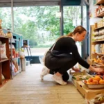 Inflation Holds at 2.8% as Food Price Rises Slow in UK Inflation stays unchanged despite earlier forecasts UK inflation stayed at 2.8% in May, according to the Office for National Statistics (ONS). Analysts had expected a rise to around 3%, but prices remained steady instead. Food price growth slowed during the month, helping balance increases in other areas such as transport and fuel. Experts had warned that global tensions, especially the Middle East conflict, could push prices higher. However, the latest peace deal between the US and Iran may reduce some of that pressure in the coming months. Transport costs drive inflation higher Transport prices continued to rise and remained the strongest contributor to inflation. Motor fuel prices were 24.6% higher than a year earlier. Overall transport inflation reached 6.8%, the highest level seen since December 2022. ONS chief economist Grant Fitzner said higher costs came mainly from airfares, vehicle taxes, and fuel prices. Food inflation slows to a 17-month low Food prices rose at a slower pace compared to previous months. Food inflation dropped from 3% in April to 2.2% in May, its lowest level since December 2024. Prices for meat, dairy, and vegetables increased, but at a reduced rate. Beef and veal prices still rose by 9.4% over the year. However, this was lower than the 13.2% rise in April and 18.8% in March, showing a clear slowdown. Retailers and food industry outlook The British Retail Consortium said lower food inflation reflects strong competition among supermarkets. Still, it warned that prices could rise again later in the year. The Food and Drink Federation said retail prices often lag behind production costs. It added that recent global disruptions, including issues around the Strait of Hormuz, have not yet fully affected shop prices. Chief executive Karen Betts explained that farmers, processors, and manufacturers face higher costs first, and these usually reach consumers after several months. Long term contracts for energy and ingredients also delay price changes. Inflation trend context Inflation has moved sharply over recent years. It fell close to zero in late 2020, then surged to 11.1% in October 2022. It later dropped to 1.7% in September 2024 before rising again to 2.8% in May 2026.