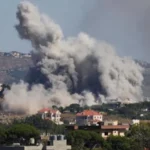 A ceasefire has reportedly been reached between Israel and Hezbollah, according to a United States official. The agreement follows days of intense fighting in southern Lebanon. Heavy strikes before the ceasefire Before the announcement, Israeli air strikes hit multiple areas in southern Lebanon. Local authorities reported 47 deaths and 97 injuries. Several of the victims were women and children, according to health officials. Even after the ceasefire timing began, reports from Nabatieh suggested that air strikes continued in some areas. This raised concerns about whether the agreement is fully holding on the ground. Ongoing clashes and military responses Israeli forces stated they would continue targeting what they call immediate threats. They also said they would respond to any ceasefire violations by Hezbollah. At the same time, Hezbollah said it carried out an ambush on an Israeli unit in southern Lebanon. The attack reportedly destroyed tanks and killed Israeli soldiers, including a battalion commander. Political reactions across the region The ceasefire comes as part of wider diplomatic efforts involving the United States and Iran. The goal is to reduce escalation in the region. Reactions from leaders have been sharp. Israeli minister Itamar Ben Gvir called for strong retaliation after Israeli casualties. He warned of severe consequences for Lebanon. Hezbollah leader Naim Qassem said the group has not been defeated and claimed Israel will eventually withdraw from Lebanese territory. Iranian foreign minister Abbas Araghchi said any violation of the agreement would be blamed on the United States. He also accused Israel of pushing for continued conflict. Tensions remain high despite agreement Israeli prime minister Benjamin Netanyahu continues to face domestic pressure to maintain military operations. Meanwhile, Hezbollah says it will continue fighting if Israeli forces remain in southern Lebanon. Although a ceasefire has been announced, fighting and air strikes reported in some areas show that the situation remains unstable.