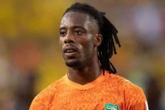 Visa cleared for Ivory Coast forward Elye Wahi Ivory Coast striker Elye Wahi has been cleared to enter Canada after initial visa delays raised concerns over his participation in the World Cup. He is now set to join the national squad for their group match against Germany. Ivory Coast national football team confirmed that all required travel permissions were secured after Canadian authorities requested further review of his legal situation. Investigation in France linked to spot fixing allegations Wahi has been linked to an ongoing investigation in France involving allegations of spot fixing and financial wrongdoing in football. Authorities in Marseille previously questioned a professional player from Ligue 1 as part of a wider probe. French football officials said they had been alerted to unusual betting activity related to a yellow card received by Wahi during a match against Metz in May. He has not been charged and was released after questioning. The investigation is still ongoing. Canada delays entry, then approves visa Canadian immigration officials initially delayed Wahi’s entry while reviewing available information. The decision was later reversed after additional checks were completed. Officials stated that each application is assessed individually under Canadian immigration law. They also confirmed that temporary permits can be granted in special cases when required conditions are met. The football federation later confirmed that Wahi had received approval and would travel with the squad. Match schedule remains unchanged Wahi is expected to be available for Ivory Coast’s upcoming World Cup fixtures. The team will face Germany in Toronto, followed by their next group match in Philadelphia. Previous legal developments in France Reports from Marseille prosecutors indicate that the investigation includes allegations of organized fraud, sports corruption, handling criminal proceeds, and money laundering. Wahi was questioned but later released. Football authorities in France have not opened disciplinary action yet but may do so depending on the outcome of the investigation. Similar visa issue involving another player Another World Cup player also faced entry issues when Ghana midfielder Thomas Partey was denied a visa to Canada due to ongoing legal proceedings in the United Kingdom. His case remains separate and unrelated to Wahi.