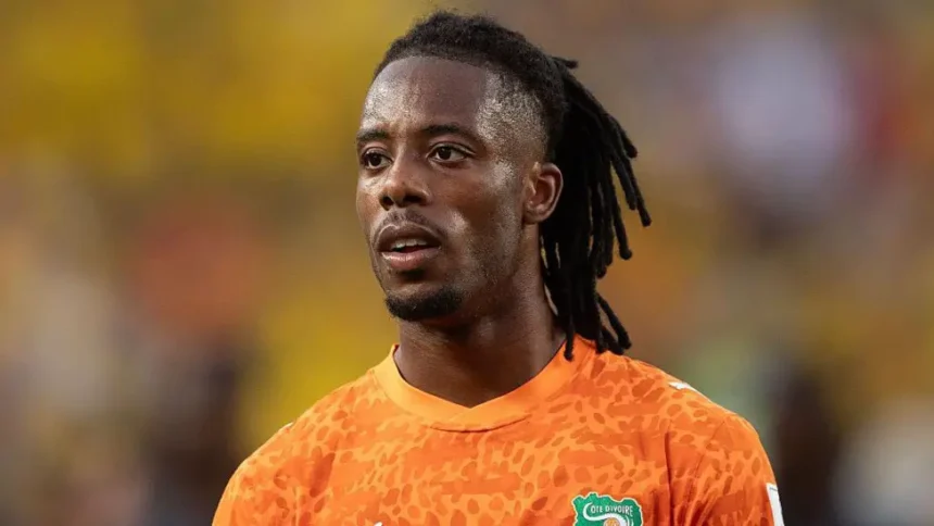 Visa cleared for Ivory Coast forward Elye Wahi Ivory Coast striker Elye Wahi has been cleared to enter Canada after initial visa delays raised concerns over his participation in the World Cup. He is now set to join the national squad for their group match against Germany. Ivory Coast national football team confirmed that all required travel permissions were secured after Canadian authorities requested further review of his legal situation. Investigation in France linked to spot fixing allegations Wahi has been linked to an ongoing investigation in France involving allegations of spot fixing and financial wrongdoing in football. Authorities in Marseille previously questioned a professional player from Ligue 1 as part of a wider probe. French football officials said they had been alerted to unusual betting activity related to a yellow card received by Wahi during a match against Metz in May. He has not been charged and was released after questioning. The investigation is still ongoing. Canada delays entry, then approves visa Canadian immigration officials initially delayed Wahi’s entry while reviewing available information. The decision was later reversed after additional checks were completed. Officials stated that each application is assessed individually under Canadian immigration law. They also confirmed that temporary permits can be granted in special cases when required conditions are met. The football federation later confirmed that Wahi had received approval and would travel with the squad. Match schedule remains unchanged Wahi is expected to be available for Ivory Coast’s upcoming World Cup fixtures. The team will face Germany in Toronto, followed by their next group match in Philadelphia. Previous legal developments in France Reports from Marseille prosecutors indicate that the investigation includes allegations of organized fraud, sports corruption, handling criminal proceeds, and money laundering. Wahi was questioned but later released. Football authorities in France have not opened disciplinary action yet but may do so depending on the outcome of the investigation. Similar visa issue involving another player Another World Cup player also faced entry issues when Ghana midfielder Thomas Partey was denied a visa to Canada due to ongoing legal proceedings in the United Kingdom. His case remains separate and unrelated to Wahi.