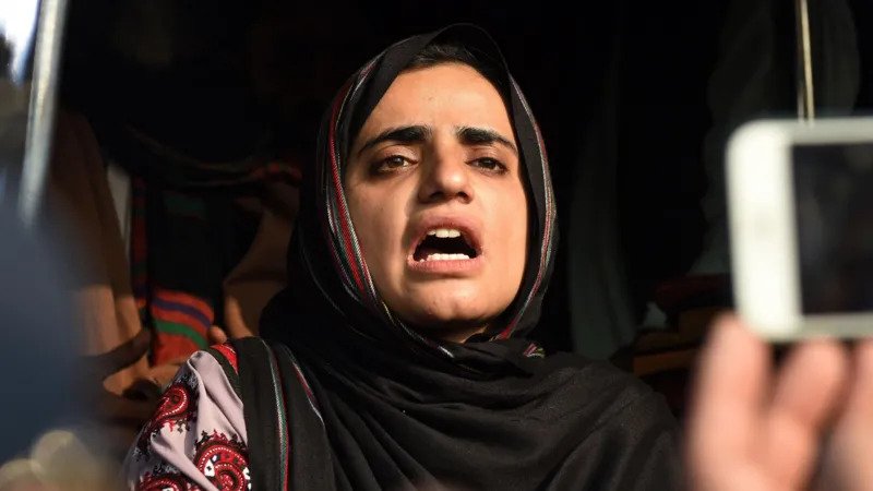 Life Sentence Handed to Activist in Gwadar Rally Case A Pakistani anti enforced disappearance campaigner, Mahrang Baloch, has been sentenced to life in prison in connection with the killing of a paramilitary soldier during a protest in 2024. She led the Balochistan Unity Committee and was convicted alongside fellow activist Sibghatullah. The court also imposed a fine of 200,000 Pakistani rupees, payable to the victim’s family. What Happened at the Gwadar Protest Prosecutors say the case relates to a rally held in Gwadar where tensions escalated between protesters and security forces. Authorities claim Mahrang Baloch delivered a highly charged speech that encouraged the crowd. According to a security official, a group of protesters attacked a vehicle carrying paramilitary personnel with sticks and stones. During the chaos, soldier Shabbir Ahmed became separated from his unit and was killed. The anti terrorism court in Quetta ruled that both activists were part of an unlawful gathering and shared responsibility for the incident. Trial Controversy and Defence Response The case has sparked strong criticism from human rights groups. The Human Rights Commission of Pakistan urged a full review of the judgment and raised concerns about fairness in the trial process. Mahrang Baloch and Sibghatullah boycotted the proceedings. Their legal team said they were denied proper legal rights and could not cross examine witnesses in a fair manner. They also claimed key testimonies were given through video link without full transparency. Supporters described the court as unfair and said the process lacked openness. On the other hand, a spokesperson for the Balochistan government said the prosecution had strong evidence and insisted the case was not politically motivated. Background of Mahrang Baloch Mahrang Baloch is widely known for her activism against enforced disappearances in Balochistan, a region affected by long standing unrest. Her activism began after her father was allegedly detained by security personnel in 2009 and later found dead with signs of torture. In 2023, she led a long march covering about 1,000 miles toward Islamabad, demanding justice for missing persons and their families. She was listed among influential global women in 2024 for her human rights work. Her organisation continues to reject claims of links with armed groups and says it focuses on peaceful rights based advocacy.