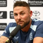 McCullum Clears the Air on Stokes Relationship England head coach Brendon McCullum has rejected talk of tension with captain Ben Stokes. He said they remain close friends and do not understand where the rumours started. McCullum explained that he spoke directly with Stokes before the third Test against New Zealand. He told him that their relationship has not changed and asked where the speculation came from. Stokes said he had no idea. Return After Disciplinary Absence Stokes missed the second Test during an internal investigation linked to a late night curfew breach after England’s win at Lord’s. Fast bowler Gus Atkinson also missed that match. Both players were present when a member of team security was struck during an incident involving a rugby player at a London nightclub. The England management cleared both players to return for the deciding match, with Stokes resuming captaincy duties. Squad Changes for the Decider England have reshaped the team again for the third Test against New Zealand. Stokes returns to lead the side. Shoaib Bashir and wicketkeeper Jamie Smith are also back in the lineup. Young batter Emilio Gay joins the XI, while experienced names such as Joe Root and Harry Brook remain central to the batting order. The pace attack includes Jofra Archer and Josh Tongue, with Gus Atkinson also returning. Players Left Out Several players miss out on selection this time. James Rew, Jordan Cox, Matthew Fisher, and Sonny Baker have been dropped from the squad. Ollie Robinson impressed earlier in the series but is not selected despite being fit. England XI for the Third Test Ben Duckett, Emilio Gay, Jacob Bethell, Joe Root, Harry Brook, Jamie Smith, Ben Stokes captain, Gus Atkinson, Jofra Archer, Josh Tongue, Shoaib Bashir