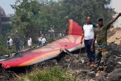 Air India Crash Investigation Still Ongoing One Year On as Final Report Delayed Investigation Update After One Year The investigation into the fatal Air India crash has not reached its final stage yet. The Indian aviation safety authority has confirmed that more time is needed before it can publish the final findings. The Aircraft Accident Investigation Bureau Aircraft Accident Investigation Bureau said it has made strong progress over the past year. Teams continue to study technical data, operational records, and human factors linked to the disaster. Officials also stated that the final report will only be released once all analysis is complete and required international review steps are finished. Crash Details and Human Loss The accident involved an Boeing 787 Dreamliner operated by Air India. It went down shortly after taking off from Ahmedabad on its way to London. The aircraft crashed about 6 kilometers from the airport. It struck a building used for medical staff housing at the Byramjee Jeejeebhoy Medical College and Civil Hospital and caused a major explosion. The disaster killed 241 people on board and 19 people on the ground. Among those who died were 169 Indian nationals and 53 British citizens. Only one passenger survived, Viswashkumar Ramesh from Leicester. Investigation Progress So Far The investigation team has reviewed flight recorder data, engine components, maintenance logs, and operational records. Officials say they have built a detailed technical picture of what happened, but the full analysis is still ongoing. They also confirmed that every aspect of the crash is being studied, including aircraft systems, human decisions, and organizational factors. Why the Report Is Delayed The authority explained that accident investigations focus on safety improvements rather than blame. Because of this, the process requires careful validation and international consultation before release. Officials added that they must complete all testing and cross check every piece of evidence before publishing final conclusions. Next Steps in the Investigation The final report will be shared only after all technical work is finished. Authorities say the goal is to improve aviation safety and prevent similar tragedies in the future.