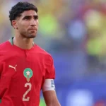 Trial Confirmed in France Morocco captain and Paris Saint Germain defender Achraf Hakimi will face trial in France after prosecutors confirmed the case will proceed. French authorities say the case involves an allegation from 2023, when a 24 year old woman accused him of rape at his home in Paris. An investigating judge ordered the trial in February 2026 after a long legal process that started in March 2023. Hakimi has denied all accusations from the beginning. He recently lost an appeal to stop the trial from going ahead, according to French media reports. Hakimi Responds Publicly Hakimi spoke on social media and rejected the allegations again. He said he has waited for years to present his side in court. He also claimed the case has affected his family and reputation. He added that he believes the justice process will allow him to speak openly and clear his name in court. Complainant Legal Position The lawyer for the woman involved said the court decision brings relief after years of legal proceedings. She said her client now has the chance to be heard properly in court. She also said the trial may support wider efforts to address sexual violence and challenge denial in professional sport environments. Football and World Cup Context Hakimi remains part of the Morocco national squad Morocco national football team and is expected to lead the team in upcoming matches. Morocco are currently playing World Cup fixtures in the United States. There are possible travel complications depending on where matches are held, since the tournament is co hosted by the United States, Canada, and Mexico. Earlier in the tournament, Thomas Partey missed a match after being denied entry to Canada while facing separate legal charges. Career Background Hakimi made his international debut in 2016 at the age of 17. He played a key role in Morocco reaching the World Cup semi finals in 2022, the first African team to do so. At club level, he joined Paris Saint Germain in 2021 and has won multiple trophies, including major European titles during his career.
