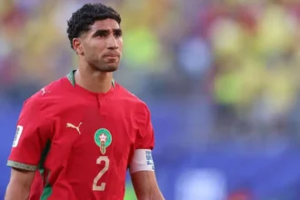 Trial Confirmed in France Morocco captain and Paris Saint Germain defender Achraf Hakimi will face trial in France after prosecutors confirmed the case will proceed. French authorities say the case involves an allegation from 2023, when a 24 year old woman accused him of rape at his home in Paris. An investigating judge ordered the trial in February 2026 after a long legal process that started in March 2023. Hakimi has denied all accusations from the beginning. He recently lost an appeal to stop the trial from going ahead, according to French media reports. Hakimi Responds Publicly Hakimi spoke on social media and rejected the allegations again. He said he has waited for years to present his side in court. He also claimed the case has affected his family and reputation. He added that he believes the justice process will allow him to speak openly and clear his name in court. Complainant Legal Position The lawyer for the woman involved said the court decision brings relief after years of legal proceedings. She said her client now has the chance to be heard properly in court. She also said the trial may support wider efforts to address sexual violence and challenge denial in professional sport environments. Football and World Cup Context Hakimi remains part of the Morocco national squad Morocco national football team and is expected to lead the team in upcoming matches. Morocco are currently playing World Cup fixtures in the United States. There are possible travel complications depending on where matches are held, since the tournament is co hosted by the United States, Canada, and Mexico. Earlier in the tournament, Thomas Partey missed a match after being denied entry to Canada while facing separate legal charges. Career Background Hakimi made his international debut in 2016 at the age of 17. He played a key role in Morocco reaching the World Cup semi finals in 2022, the first African team to do so. At club level, he joined Paris Saint Germain in 2021 and has won multiple trophies, including major European titles during his career.