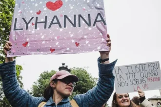 # Murder of 11-Year-Old Lyhanna Sparks Outrage Across France The tragic murder of 11-year-old Lyhanna has shocked France and triggered widespread public anger. Tens of thousands of people joined demonstrations across the country after learning that the main suspect had previously been reported multiple times for alleged sexual abuse. The case has placed France's justice system under intense scrutiny. Many citizens believe authorities missed several opportunities to prevent the tragedy. ## Nationwide Protests Demand Accountability More than 60,000 protesters gathered in cities across France to express their anger and demand answers. Many demonstrators called for the resignation of Justice Minister Gérald Darmanin, arguing that serious failures within the justice system may have contributed to the crime. Public frustration continues to grow as new details emerge about the suspect's background and previous allegations. ## Previous Abuse Allegations Raise Questions The suspect, 41-year-old Jérome Barella, was reportedly accused of sexually abusing a 10-year-old girl named Rosa. Her mother filed a complaint with police in August last year. Medical examinations reportedly supported the abuse claims. Despite this evidence, investigators did not question Barella during the following nine months. Many people now believe that earlier action by authorities could have increased monitoring of the suspect and possibly prevented Lyhanna's death. ## Discovery of Lyhanna's Body Lyhanna disappeared after leaving school in the town of Fleurance in southwestern France. Her body was discovered six days later at a farm located about 10 kilometers from the town. Police arrested Barella three days after her disappearance. According to investigators, he admitted driving Lyhanna to a local swimming pool. However, he denied involvement in her death. During questioning before an investigating judge, Barella reportedly refused to answer questions related to the case. ## More Allegations Come to Light Authorities later revealed that Barella had been named in several other alleged sexual abuse cases over recent years. These reports have intensified criticism of the justice system. Many citizens question why earlier complaints did not receive greater attention. Critics argue that repeated allegations should have triggered a faster and more thorough investigation. ## Government Faces Growing Pressure Rosa's mother has announced legal action against the French state and Justice Minister Gérald Darmanin. Her legal team claims authorities failed to respond appropriately to the allegations. Darmanin acknowledged that the case exposed serious shortcomings within state services. However, he rejected calls to resign. The government now faces increasing pressure from the public while also dealing with criticism from judicial officials. ## Magistrates Defend the Justice System France's Higher Magistrature Council defended judges and prosecutors involved in the system. The council warned against blaming the entire judiciary for the actions of individuals or administrative failures. Officials stated that some groups are using the case to unfairly target magistrates before all facts have been fully examined. ## A Nation Demands Answers As investigations continue, the murder of Lyhanna remains at the center of national debate. The case has reignited concerns about child protection, law enforcement responses, and accountability within the justice system. For many families across France, the tragedy highlights the importance of acting quickly when abuse allegations emerge. Citizens are now demanding reforms to ensure similar failures do not happen again.