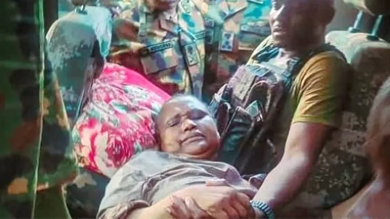Nigerian Army Rescues Widow of Late General After Kidnapping Tragedy The Nigerian Army has successfully rescued Amina Abubakar, the wife of retired Major General Rabe Abubakar, weeks after armed kidnappers abducted the couple in Nigeria's Katsina State. The rescue operation brought relief to the family after a tragic period that saw the former military officer lose his life while being held captive. Military officials confirmed that Mrs. Abubakar is receiving treatment at a military hospital after sustaining injuries during the operation. Rescue Operation Brings Hope According to military authorities, troops intensified search efforts and tracked the kidnappers to their location. During the operation, the criminals opened fire and shot Mrs. Abubakar before fleeing as soldiers advanced. Despite her injuries, soldiers successfully rescued her and transferred her to a military medical facility for treatment. Officials stated that medical teams are closely monitoring her condition and providing all necessary care. Military spokesperson Samaila Uba said the armed forces remain committed to ensuring her full recovery and supporting her family throughout the process. Family Expresses Gratitude The rescue sparked emotional reactions from family members. Bilkisu Abubakar, one of the couple's daughters, shared a message of gratitude and relief following her mother's rescue. She thanked God for protecting her mother and prayed for her complete recovery after the traumatic experience. Family members continue to support Mrs. Abubakar as she receives medical treatment. Retired General Died in Captivity The kidnapping took a devastating turn when retired Major General Rabe Abubakar died while still in captivity. Authorities believe his death resulted from existing health conditions, including diabetes and high blood pressure. The retired officer passed away before security forces could complete the rescue mission. Government officials later buried his remains and paid tribute to his service to the nation. Kidnappers Released Disturbing Video Earlier this month, a video appeared online showing the retired general and his wife pleading for help. In the recording, they urged the Katsina State government to release detained bandits and confiscated livestock in exchange for their freedom. The video highlighted the difficult conditions faced by kidnapping victims and raised concerns about growing insecurity in parts of northern Nigeria. Security Forces Continue Hunt for Criminals No group has claimed responsibility for the abduction. However, criminal gangs commonly known as "bandits" frequently carry out kidnappings, cattle theft, and attacks on rural communities across northwestern Nigeria. Security agencies have vowed to continue tracking those responsible. Military officials stated that ongoing operations aim to capture the kidnappers and prevent similar incidents in the future. President Reacts to General's Death President Bola Tinubu expressed shock over the retired general's death. He described the incident as a painful reminder of the security challenges posed by armed criminal groups operating across the country. The president also reaffirmed the government's commitment to strengthening security measures and protecting citizens from criminal violence.