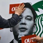 Starbucks Korea to close stores briefly after public backlash over campaign Public outrage over promotional campaign Starbucks in South Korea faced strong criticism after a promotional campaign sparked anger. The campaign launched reusable cups linked to a product theme that many people said was insensitive. The timing coincided with the anniversary of the Gwangju Uprising, a tragic event where civilians were killed during a military crackdown. Nationwide apology and action The company operating Starbucks in South Korea, Shinsegae Group, responded quickly. It removed its country chief executive after the backlash. The chairman also agreed to take part in the training program. Starbucks Korea issued an apology and said it did not intend to cause public harm or discomfort. Stores to close for staff training All Starbucks stores in South Korea will close for three hours in the afternoon next Wednesday. They will shut at 3 pm local time and reopen the next day. This marks the first nationwide early closure since the brand entered the country in 1999. Employees will also take part in an internal learning session earlier in the week. The session will focus on historical awareness and social sensitivity through video based training. Government and public reaction South Korea’s president strongly criticised the campaign and called it inappropriate and offensive. Public protests took place outside several stores. The company also saw a noticeable drop in sales after boycott calls spread online. Background of the controversy The promotion featured a tumbler series described as having a large capacity. The branding and timing led to criticism because it coincided with a sensitive historical anniversary. Starbucks Korea later clarified that the product line was part of a wider campaign running over several days.
