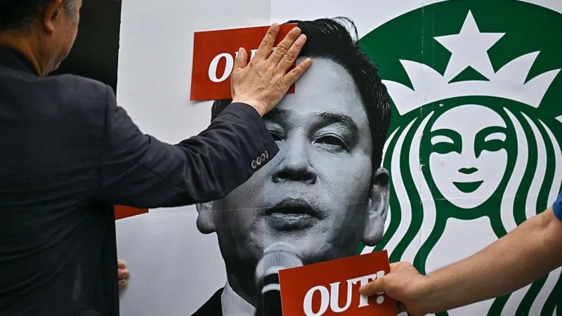 Starbucks Korea to close stores briefly after public backlash over campaign Public outrage over promotional campaign Starbucks in South Korea faced strong criticism after a promotional campaign sparked anger. The campaign launched reusable cups linked to a product theme that many people said was insensitive. The timing coincided with the anniversary of the Gwangju Uprising, a tragic event where civilians were killed during a military crackdown. Nationwide apology and action The company operating Starbucks in South Korea, Shinsegae Group, responded quickly. It removed its country chief executive after the backlash. The chairman also agreed to take part in the training program. Starbucks Korea issued an apology and said it did not intend to cause public harm or discomfort. Stores to close for staff training All Starbucks stores in South Korea will close for three hours in the afternoon next Wednesday. They will shut at 3 pm local time and reopen the next day. This marks the first nationwide early closure since the brand entered the country in 1999. Employees will also take part in an internal learning session earlier in the week. The session will focus on historical awareness and social sensitivity through video based training. Government and public reaction South Korea’s president strongly criticised the campaign and called it inappropriate and offensive. Public protests took place outside several stores. The company also saw a noticeable drop in sales after boycott calls spread online. Background of the controversy The promotion featured a tumbler series described as having a large capacity. The branding and timing led to criticism because it coincided with a sensitive historical anniversary. Starbucks Korea later clarified that the product line was part of a wider campaign running over several days.