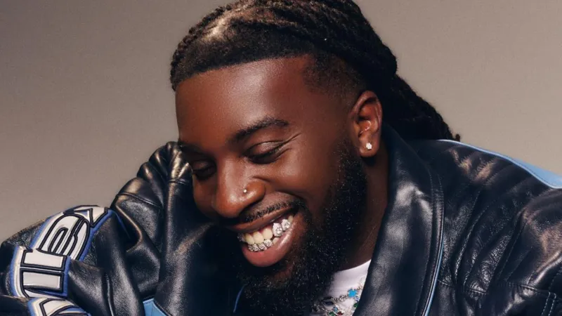 Grammy winning songwriter Talay Riley, real name Mark Orabiyi, died after a stabbing in east London. Artists including Stormzy and Wretch 32 paid tribute.