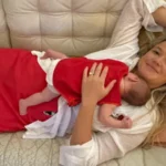 Sydney shark attack survivor wakes from induced coma
