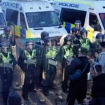 Three men admit violent disorder after Southampton protests Three men have pleaded guilty to violent disorder following protests in Southampton that broke out after the murder of 18 year old Henry Nowak. The case has led to multiple court hearings and ongoing legal action. Connor Bishop, 24, Reece Robinson, 21, and Noah Etherington, 18, admitted the charge during hearings in Southampton and Portsmouth magistrates’ courts. Police arrested the trio after disorder during protests on Tuesday night. What the court heard Prosecutors said CCTV footage showed Connor Bishop throwing a traffic cone toward police officers during the unrest. Etherington was also seen near a police line and throwing a brick in the direction of officers. Daniel Frost, 44, also admitted violent disorder. He was also found in possession of a dog lead with a metal clip, which was treated as an offensive weapon. A separate defendant, 50 year old Matt Styler from Gosport, denied assaulting a police officer. Background to the protests The protests followed the release of police body camera footage showing Henry Nowak being placed in handcuffs after he had been stabbed by 23 year old Vickrum Digwa. Digwa has since been jailed for life, with a minimum term of 21 years. Wider reaction The incident has triggered public debate and political reaction. The prime minister called for calm and urged people not to use the case to encourage further unrest. He also referenced the wishes of the victim’s family.