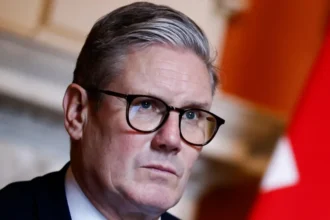 Sir Keir Starmer: From Top Lawyer to Shortest Serving UK Prime Minister A rapid rise followed by a sharp political fall Sir Keir Starmer rose from a high profile legal career to become a leading figure in British politics. He entered politics later in life, becoming a Member of Parliament in his 50s after years working as a senior lawyer. His background set him apart from many Labour leaders who had spent decades building political careers. In 2024, he led Labour to a major general election win. The victory gave the party a large parliamentary majority, placing him alongside historic Labour figures such as Tony Blair and Clement Attlee. However, the result came with a low share of the overall national vote, which raised early questions about his long term support. Leadership style and public perception Starmer presented himself as a practical and steady leader focused on national interest. He promised to rebuild trust in politics and guide the country into what he called a period of calmer governance. Inside his party, opinions were divided. Supporters saw him as disciplined and serious, while critics argued he lacked a clear political identity. Some MPs believed his approach felt too controlled and lacked strong messaging. His communication style also became a point of criticism. In an era where voters respond strongly to emotional and direct messaging, his calm and legalistic tone sometimes failed to connect with the wider public. This led to the nickname “Mr Rules,” reflecting his structured and procedural style. Political challenges and loss of support Soon after entering office, his popularity began to decline. A series of policy changes and political adjustments weakened public confidence. These shifts created uncertainty among voters and frustration within parts of his party. Over time, internal pressure increased. Questions about leadership strength and electoral direction grew louder, especially as opinion polls moved against Labour. Resignation and political consequences Facing mounting pressure from within his party, Starmer accepted that he no longer had full support. He announced his resignation in an emotional speech outside Downing Street, stating that he respected the decision of his parliamentary colleagues. He agreed to remain in office until a successor is chosen. His departure marks a dramatic turnaround from the expectations that followed his 2024 victory, when he was seen as a long term leader for Labour. His time in office is now viewed as unusually short for a prime minister who had entered power with such a strong parliamentary majority.
