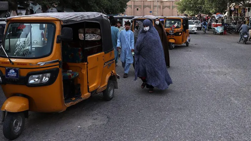 Herat Women Protest Turns Violent as Security Forces Respond Protest breaks out in western Afghanistan city A rare protest took place in Herat after reports emerged that women were being detained for not following strict dress rules linked to hijab enforcement. Both men and women joined the demonstration, demanding an end to arrests and restrictions on women’s daily lives. Witnesses say the gathering formed shortly after local reports of increased monitoring of women in public spaces. Some described a growing climate of fear in markets and streets as patrols checked women’s clothing compliance. Security forces respond to crowd Security personnel moved in to disperse the protest. According to people present, forces used sticks, whips, and firearms. Gunfire was also heard during the incident, with some witnesses reporting shots fired into the air. Medical staff confirmed that two people died and several others were injured. The exact cause of death was not officially confirmed. Authorities in Herat rejected claims of fatalities. They said officers acted to maintain public order and denied that any deaths occurred. Voices from the scene Eyewitnesses described chaotic scenes as the protest escalated. Some protesters reported injuries and panic as security forces advanced. Videos shared online showed loud gunfire and people screaming for safety. One protester said many people were hurt and described a strong security response. Another witness said officers struck demonstrators and used firearms toward the crowd area. Officials defended their response, saying the protest threatened stability and public safety. They also accused some participants of creating unrest under the issue of dress code enforcement. Background to rising tensions The protest came after reports that women were being detained for not wearing hijab in the required manner. Eyewitness accounts suggest increased street checks by morality enforcement officers in the days leading up to the demonstration. Since the return of Taliban rule in 2021, protests led by women have been rare. Earlier demonstrations faced arrests, beatings, and intimidation, which discouraged further public gatherings. Hijab rules became mandatory in 2022, along with other restrictions affecting women’s education, movement, and public presence. International reaction A United Nations human rights official expressed concern over the reported use of force. The statement called for accountability and raised alarm over violence against peaceful demonstrators.