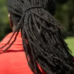Supreme Court Rules Against Rastafarian Inmate in Dreadlocks Case Background of the Case The US Supreme Court has ruled that a former Louisiana prisoner cannot seek financial damages against prison staff who forced him to cut his dreadlocks. The decision involved Damon Landor, a Rastafarian who said his religious beliefs were violated when officials shaved his hair during his incarceration. Religious Meaning of Dreadlocks For Rastafarians, dreadlocks are more than a hairstyle. They represent faith, discipline, and spiritual identity. Landor said his hair was part of who he is and described its removal as a loss of his “crown”. What Happened in Prison In 2020, while serving time for a drug related offense, Landor was moved to Raymond Laborde Correctional Center in Louisiana. Prison staff handcuffed him and forcibly shaved his head after he refused, saying it violated his religious rights. He had already worn dreadlocks for months during his sentence. Before the incident, he also showed guards a court ruling that supported Rastafarian prisoners’ right to keep their hair. According to court records, officers ignored the document. Supreme Court Ruling The case was decided by a 6 to 3 vote. The majority ruled that the Religious Land Use and Institutionalized Persons Act (RLUIPA) does not allow prisoners to sue individual state officials for money damages. Justice Neil Gorsuch wrote that the law does not place personal liability on government employees because Congress did not clearly include that option when it passed the act. Dissenting Opinion The three liberal justices disagreed. Justice Ketanji Brown Jackson said the purpose of RLUIPA is to protect religious freedom in prisons. She warned that prisoners who suffer clear violations may now have no practical legal remedy. Impact of the Decision The ruling limits how prisoners can hold individual officers accountable in religious freedom cases. It also raises concerns about whether inmates can effectively defend their rights when violations occur inside state prisons.