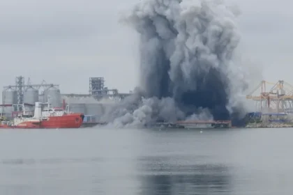 # Ukraine Strikes Cargo Ships in Sea of Azov as Putin Prepares Major Address Ukraine has claimed responsibility for striking five cargo vessels operating in the Sea of Azov and waters near Russian occupied territories. Ukrainian officials say the ships were involved in transporting stolen grain, fuel, and military supplies. The operation comes at a critical moment in the war. Russian President Vladimir Putin is preparing to deliver a major speech at an economic forum in St. Petersburg. The development also follows Ukrainian President Volodymyr Zelensky's recent proposal for direct peace talks with the Russian leader. ## Ukraine Targets Vessels in Occupied Waters According to Ukraine's drone forces commander, the targeted vessels were operating near the ports of Mariupol and Berdyansk. Ukrainian authorities accused the ships of secretly moving cargo from occupied territories. Officials stated that the vessels had removed or concealed identifying markings. They also reportedly switched off radar systems to avoid detection while transporting grain, fuel, and military equipment. Ukraine believes these activities helped support Russia's military operations and the movement of resources from occupied areas. ## Azerbaijan Reports Deaths Following Attacks Azerbaijan's Foreign Ministry confirmed that five Azerbaijani citizens were killed during attacks involving two of the vessels. The ministry identified the ships as the Nastra and the Circon. However, officials did not directly blame any country for the attacks. They also clarified that the vessels were not owned by Azerbaijan. Ukrainian military officials have not reported any casualties related to the operation. ## Naval Drone Explosion Reported Near Romania In a separate incident, Ukraine confirmed that one of its naval drones exploded off Romania's coastline on Friday. Authorities reported no injuries or damage from the blast. The incident has drawn attention because Romania is a member of NATO and shares a border with Ukraine. Officials have not released additional details about the cause of the explosion. ## Zelensky Highlights Pressure on Russia President Zelensky said Russia is feeling the effects of continued Ukrainian attacks on military and energy infrastructure. He argued that drone and missile strikes, fuel shortages, and rising prices have increased pressure on Russian society. Zelensky also renewed his call for direct talks aimed at ending the conflict. Ukraine has regularly targeted strategic facilities inside Russia. Kyiv says these operations are designed to weaken Russia's ability to sustain the war. ## Putin Arrives in St. Petersburg The latest developments come as President Putin arrives in St. Petersburg for a major economic forum. His visit follows a Ukrainian drone attack that reportedly targeted areas on the outskirts of the city a day earlier. The timing highlights the growing intensity of the conflict as both sides continue military operations while discussing the possibility of future negotiations. ## Growing Tensions in the Region The strikes in the Sea of Azov and the drone explosion near Romania demonstrate how the conflict continues to affect multiple regions beyond the main battlefield. With diplomatic efforts still uncertain, military actions remain a central feature of the war. Both Ukraine and Russia continue to pursue strategic objectives while international observers closely monitor developments.