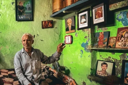 We Don’t Look at the Sky Anymore: Families Living with the Ahmedabad Air Crash Tragedy Introduction Ahmedabad is still living with the memory of a devastating air crash that killed 260 people. Most were passengers on the plane, but 19 people on the ground also lost their lives when the aircraft struck the BJ Medical College hostel area near the airport. One year later, grief has not faded for families who live nearby. Lives Changed in an Instant Prahlod Thakur lost his wife, Sarlaben, and his granddaughter, Aadhya. They were inside the hostel complex when the crash happened. Their photos still hang on the walls of his home. He sees them every morning. The loss remains heavy, and he often feels overwhelmed when he looks at their pictures. A Site That Never Healed The hostel building still shows clear damage. Upper floors remain open to the sky. Concrete is broken and scattered. Stairs are dark with burn marks. Personal items are still buried in dust and debris. The building has not returned to normal use. Plans exist to demolish it and rebuild, but no full cleanup has taken place yet. Daily Life Around the Ruins Students continue their studies nearby. They walk past the damaged building every day. Air traffic still passes overhead frequently. Before the crash, the sound of planes felt normal. Now it brings back painful memories for many residents and students. Grief That Does Not Fade For families like Thakur’s, healing feels out of reach. The sound of a passing aircraft brings back the same shock they felt during the disaster. Many say they avoid looking at the sky. The tragedy has changed how they experience everyday life. Future Plans and Uncertain Closure Authorities have approved demolition of the damaged hostel complex. A new building is planned for the site. However, the delay in removal of the wreckage has kept the emotional wound open for many families and students.