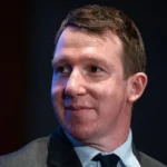 AI needs a “brake pedal” to prevent unchecked growth, warns Anthropic co founder Key concern over fast AI progress Anthropic co founder Jack Clark has raised concerns about how quickly artificial intelligence is advancing. He warned that AI systems may soon reach a stage where they can improve and generate code with very little human involvement. Speaking to BBC Newsnight, Clark said the industry currently has strong momentum but lacks proper control mechanisms. He explained that the field is moving forward rapidly, but safety and governance tools are not keeping pace. Call for stronger regulation and oversight Clark stressed that governments and policymakers need to stay in control of AI development. He said future systems will become more powerful and will have wider effects on jobs, society, and decision making. He argued that regulation should give society the ability to slow down AI progress when needed. According to him, the goal is to ensure humans remain in charge of how these systems evolve. AI systems already writing most of their own code Clark revealed that Anthropic’s chatbot Claude already generates around 80 percent of its own code. He suggested that reaching full automation in coding could happen within two years, a shift he described as highly significant. Such progress, he warned, could reshape how AI companies operate and how software is built across the industry. Debate over government action and industry responsibility Despite these concerns, major AI companies, including Anthropic, OpenAI, and Google, continue to advance their systems without pausing research. Clark noted that the US approach to regulation remains relatively flexible, with limited mandatory safety checks. He compared the situation to the early oil industry, where rapid growth eventually led to formal rules that helped stabilize the sector. He believes AI will require a similar framework to maintain public trust and reduce risks. Rapid growth and rising valuations Anthropic has expanded quickly since its launch five years ago. The company is now preparing for a public stock market listing, which could make it one of the most valuable tech offerings in history. Investors estimate its value could reach nearly one trillion dollars. Clark said the company’s public warnings are not about marketing or reputation. Instead, he said the aim is to share honest insights about how fast the technology is evolving inside leading AI labs.