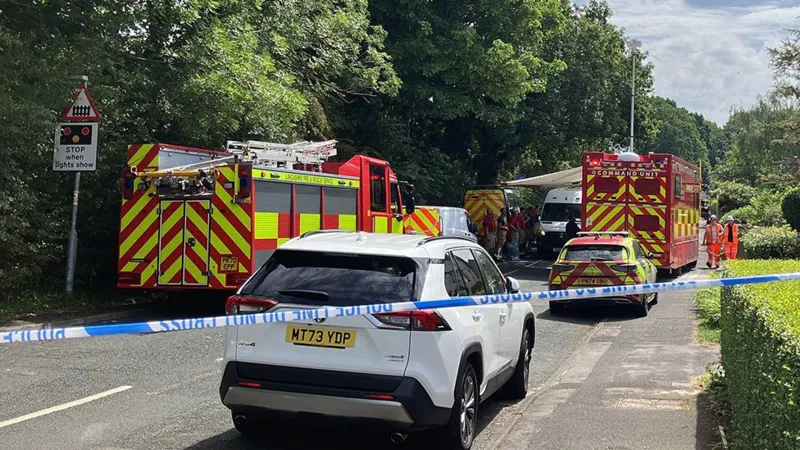Woman dead and girl, 8, injured as train hits car