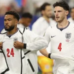 # England Assess Reece James and Declan Rice Ahead of Panama World Cup Match ## Midfield and Defensive Concerns for England England's coaching staff are closely monitoring the fitness of Reece James and Declan Rice before their final World Cup group stage fixture against Panama on Saturday. Both players picked up fitness concerns following England's goalless draw against Ghana. Medical staff will continue evaluating their conditions before making a final decision on their availability. ## Rice Dealing With Calf and Hamstring Issues Declan Rice left Boston Stadium with heavy strapping on his left calf after Tuesday's match. While the injury raised concerns among supporters, sources suggest there is no major threat to his long term participation in the tournament. The England midfielder had already been managing a hamstring problem. During the earlier match against Croatia, he experienced nerve pain linked to that issue and was substituted as a precaution. England's medical team plans to assess Rice's recovery over the coming days. Coaches will then determine whether it is worth risking him against Panama or allowing additional time for recovery. ## Reece James Also Under Observation Reece James completed the full 90 minutes against Ghana, but the defender will also undergo further medical checks. The Chelsea captain has faced several injury setbacks throughout his career. Because of that history, England's staff remain cautious about managing his workload during the tournament. Although James showed no obvious signs of discomfort during the match, coaches want to ensure he remains fully fit for the knockout stages. ## England Prioritising Player Fitness With qualification hopes still in their hands, England's management team must balance immediate results with the long term fitness of key players. Rice remains one of the team's most important midfielders, while James provides valuable experience and defensive strength. Any decision regarding their involvement against Panama will depend on medical assessments and recovery progress. Supporters are expected to receive an official update later this week as England continue preparations for their crucial World Cup encounter. ## What Happens Next? England's medical staff will closely monitor both players over the next 24 to 48 hours. If their recovery progresses well, they could feature against Panama. However, the coaching staff may choose a cautious approach to avoid aggravating any injuries before the knockout rounds begin. The coming days will be important as England look to secure a positive result while keeping their squad healthy for the challenges ahead.