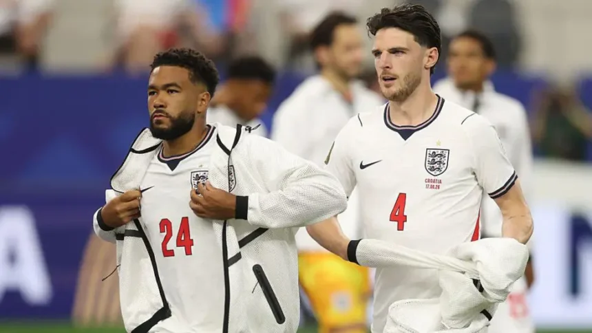 # England Assess Reece James and Declan Rice Ahead of Panama World Cup Match ## Midfield and Defensive Concerns for England England's coaching staff are closely monitoring the fitness of Reece James and Declan Rice before their final World Cup group stage fixture against Panama on Saturday. Both players picked up fitness concerns following England's goalless draw against Ghana. Medical staff will continue evaluating their conditions before making a final decision on their availability. ## Rice Dealing With Calf and Hamstring Issues Declan Rice left Boston Stadium with heavy strapping on his left calf after Tuesday's match. While the injury raised concerns among supporters, sources suggest there is no major threat to his long term participation in the tournament. The England midfielder had already been managing a hamstring problem. During the earlier match against Croatia, he experienced nerve pain linked to that issue and was substituted as a precaution. England's medical team plans to assess Rice's recovery over the coming days. Coaches will then determine whether it is worth risking him against Panama or allowing additional time for recovery. ## Reece James Also Under Observation Reece James completed the full 90 minutes against Ghana, but the defender will also undergo further medical checks. The Chelsea captain has faced several injury setbacks throughout his career. Because of that history, England's staff remain cautious about managing his workload during the tournament. Although James showed no obvious signs of discomfort during the match, coaches want to ensure he remains fully fit for the knockout stages. ## England Prioritising Player Fitness With qualification hopes still in their hands, England's management team must balance immediate results with the long term fitness of key players. Rice remains one of the team's most important midfielders, while James provides valuable experience and defensive strength. Any decision regarding their involvement against Panama will depend on medical assessments and recovery progress. Supporters are expected to receive an official update later this week as England continue preparations for their crucial World Cup encounter. ## What Happens Next? England's medical staff will closely monitor both players over the next 24 to 48 hours. If their recovery progresses well, they could feature against Panama. However, the coaching staff may choose a cautious approach to avoid aggravating any injuries before the knockout rounds begin. The coming days will be important as England look to secure a positive result while keeping their squad healthy for the challenges ahead.