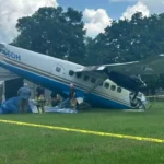 Tragic Skydiving Flight Ends in Deadly Crash A small skydiving aircraft crashed near Butler, Missouri, around 11:20 local time on Sunday. The plane was carrying 11 passengers and one pilot. No one survived the crash. Witnesses said the aircraft suddenly lost control shortly after departure and spun sharply before hitting the ground. Witness Accounts of the Final Moments People who saw the incident described a fast and steep descent. One witness said the plane was almost vertical as it came down and struck the ground at high speed. They explained that there was no time for anyone to react or attempt a safe exit. The aircraft was too low for parachutes to deploy effectively, leaving no chance of survival. Another local skydiver shared that several people on board were known within the community. Many of them had regular experience in skydiving and were familiar faces at local drop zones. Emergency Response and Investigation Federal aviation authorities confirmed that the aircraft was a Pacific Aerospace P750. It crashed while departing from the airfield. Investigators have already arrived at the crash site to begin examining wreckage and flight conditions. Officials are working to determine what caused the plane to lose control so soon after takeoff. Local law enforcement described the incident as a mass casualty event due to the total loss of life. Company Statement and Community Impact The skydiving operator expressed deep sorrow over the incident and described it as a major loss for the wider skydiving community. The company stated that it is cooperating fully with aviation authorities during the investigation. Officials also noted that the aircraft was not in active communication with air traffic control at the time of the crash, as it was not required for that type of flight operation.