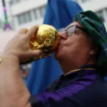 # Scotland Fans Hope for Historic World Cup Progress Against Brazil Thousands of Scotland supporters are eagerly awaiting their team's crucial World Cup group stage match against Brazil. The game could determine whether Scotland reaches the knockout rounds of the tournament for the first time in its history. Fans from across Scotland have travelled to Miami to support the national team, while many more will watch from home. Excitement continues to grow as Scotland stands on the verge of a historic achievement. ## Tartan Army Believes History Is Within Reach The atmosphere in Miami has been electric as members of the Tartan Army gather ahead of the high stakes encounter. Many supporters believe this could be a landmark moment for Scottish football. Stevie Parker, who travelled from Larbert, said confidence among fans remains high. He believes Scotland has a strong chance of getting the result needed to move forward in the competition. According to supporters, reaching the knockout stage would mark one of the greatest moments in the country's football history. ## Fans Calculate Scotland's Qualification Chances While celebrations have filled the streets of Miami, many supporters continue to keep a close eye on qualification scenarios. Brian Guthrie from Inverness admitted he has been tracking every possible outcome. He remains optimistic about Scotland's chances and hopes the team can secure a place in the next round. Many fans are already dreaming of following Scotland to future matches if qualification becomes official. ## Opportunity to Rewrite World Cup History For some supporters, the Brazil match carries special emotional significance. Ewen MacDonald from Machrihanish celebrated his birthday in Miami just days before the game. He remembers Scotland's disappointing exit from the 1998 World Cup and hopes this tournament will produce a different outcome. Fans believe the current squad has the talent and determination needed to create a new chapter in Scottish football history. ## Scotland's Knockout Stage Dream Scotland enters the match knowing that a win or draw against five time world champions Brazil would put the team in a strong position to reach the knockout rounds. The possibility of advancing beyond the group stage has created excitement among supporters both in Miami and across Scotland. As kickoff approaches, fans remain hopeful that the national team can deliver a memorable performance and achieve a historic World Cup milestone.