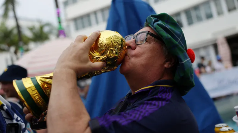# Scotland Fans Hope for Historic World Cup Progress Against Brazil Thousands of Scotland supporters are eagerly awaiting their team's crucial World Cup group stage match against Brazil. The game could determine whether Scotland reaches the knockout rounds of the tournament for the first time in its history. Fans from across Scotland have travelled to Miami to support the national team, while many more will watch from home. Excitement continues to grow as Scotland stands on the verge of a historic achievement. ## Tartan Army Believes History Is Within Reach The atmosphere in Miami has been electric as members of the Tartan Army gather ahead of the high stakes encounter. Many supporters believe this could be a landmark moment for Scottish football. Stevie Parker, who travelled from Larbert, said confidence among fans remains high. He believes Scotland has a strong chance of getting the result needed to move forward in the competition. According to supporters, reaching the knockout stage would mark one of the greatest moments in the country's football history. ## Fans Calculate Scotland's Qualification Chances While celebrations have filled the streets of Miami, many supporters continue to keep a close eye on qualification scenarios. Brian Guthrie from Inverness admitted he has been tracking every possible outcome. He remains optimistic about Scotland's chances and hopes the team can secure a place in the next round. Many fans are already dreaming of following Scotland to future matches if qualification becomes official. ## Opportunity to Rewrite World Cup History For some supporters, the Brazil match carries special emotional significance. Ewen MacDonald from Machrihanish celebrated his birthday in Miami just days before the game. He remembers Scotland's disappointing exit from the 1998 World Cup and hopes this tournament will produce a different outcome. Fans believe the current squad has the talent and determination needed to create a new chapter in Scottish football history. ## Scotland's Knockout Stage Dream Scotland enters the match knowing that a win or draw against five time world champions Brazil would put the team in a strong position to reach the knockout rounds. The possibility of advancing beyond the group stage has created excitement among supporters both in Miami and across Scotland. As kickoff approaches, fans remain hopeful that the national team can deliver a memorable performance and achieve a historic World Cup milestone.