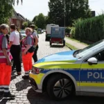 Six Dead After Shooting at Youth Welfare Centre in Germany, Suspect Arrested A tragic shooting at a youth welfare centre in Stade, northern Germany, has left six people dead and several others injured. Authorities arrested the suspected gunman and launched an investigation into what led to the deadly attack. Four Women Among the Victims Police confirmed that four women and one man died inside the welfare centre on Monday afternoon. Another victim later died in hospital after suffering critical injuries. Officials said all six victims were adults. Emergency crews rushed to the scene shortly after the shooting began. Several injured people also received treatment, although authorities have not released their identities or conditions. Large Police Response in Stade The shooting took place at a youth welfare facility on Dankersstrasse in Stade, a city located about 30 kilometres west of Hamburg. Police quickly secured the area and urged residents to stay away while officers carried out their investigation. A large number of police officers, medical teams, and emergency personnel responded to the incident. Authorities later announced that there was no further threat to the public. Suspect in Custody Police arrested the suspected shooter shortly after the attack. Investigators are also examining the possible involvement of two additional individuals. At this stage, officials have not revealed the motive behind the shooting. Detectives continue to gather evidence and interview witnesses to determine exactly what happened. Children Safe During the Incident Local media reports said the welfare centre housed women and children. Officials also confirmed that children at a nearby daycare centre remained inside during the incident for safety reasons. School-aged children in the area were later picked up by their parents after authorities secured the scene. Investigation Continues The city of Stade, home to around 50,000 residents, remains in shock following one of the deadliest incidents in the region in recent years. Investigators are expected to release more information as the inquiry continues. Authorities have asked anyone with information about the shooting to contact police as they work to establish the circumstances surrounding the tragedy.