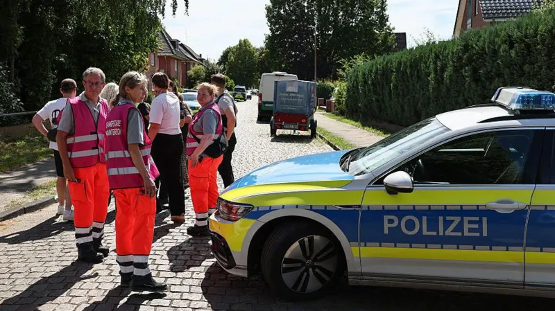 Six Dead After Shooting at Youth Welfare Centre in Germany, Suspect Arrested A tragic shooting at a youth welfare centre in Stade, northern Germany, has left six people dead and several others injured. Authorities arrested the suspected gunman and launched an investigation into what led to the deadly attack. Four Women Among the Victims Police confirmed that four women and one man died inside the welfare centre on Monday afternoon. Another victim later died in hospital after suffering critical injuries. Officials said all six victims were adults. Emergency crews rushed to the scene shortly after the shooting began. Several injured people also received treatment, although authorities have not released their identities or conditions. Large Police Response in Stade The shooting took place at a youth welfare facility on Dankersstrasse in Stade, a city located about 30 kilometres west of Hamburg. Police quickly secured the area and urged residents to stay away while officers carried out their investigation. A large number of police officers, medical teams, and emergency personnel responded to the incident. Authorities later announced that there was no further threat to the public. Suspect in Custody Police arrested the suspected shooter shortly after the attack. Investigators are also examining the possible involvement of two additional individuals. At this stage, officials have not revealed the motive behind the shooting. Detectives continue to gather evidence and interview witnesses to determine exactly what happened. Children Safe During the Incident Local media reports said the welfare centre housed women and children. Officials also confirmed that children at a nearby daycare centre remained inside during the incident for safety reasons. School-aged children in the area were later picked up by their parents after authorities secured the scene. Investigation Continues The city of Stade, home to around 50,000 residents, remains in shock following one of the deadliest incidents in the region in recent years. Investigators are expected to release more information as the inquiry continues. Authorities have asked anyone with information about the shooting to contact police as they work to establish the circumstances surrounding the tragedy.