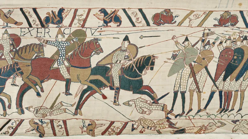 Bayeux Tapestry Returns to UK After 900 Years Under Heavy Security The famous Bayeux Tapestry has arrived in the United Kingdom for the first time in almost 900 years. The historic 11th century artwork reached the British Museum under strict police protection after being transported from northern France. The 70 metre long embroidered masterpiece shows 58 detailed scenes from the events before the Battle of Hastings and the Norman Conquest of England in 1066. The battle changed the future of England and remains one of the most important moments in British history. Historic Arrival at the British Museum The valuable artwork arrived at 02:50 BST in a specially protected transport vehicle. A large secure crate containing the tapestry was carefully removed from the lorry at the British Museum loading area. Museum officials, including British Museum director Nick Cullinan and the French ambassador to the UK, attended the historic arrival. Cullinan described the moment as extraordinary and said the museum was excited to share the rare artwork with visitors from around the world. The exhibition team also expressed their emotions during the arrival. Millie Horton Insch, the project curator for the exhibition, said seeing such an important historical object arrive was a deeply meaningful experience. A Masterpiece From the 11th Century The Bayeux Tapestry is not a traditional painting. It is a detailed embroidery that tells the story of William the Conqueror’s journey and the events that led to the Norman takeover of England. Historians believe the artwork was created shortly after the Battle of Hastings. It provides a unique view of medieval life, warfare, ships, soldiers, and political events from nearly 1,000 years ago. The British Museum will place the tapestry on public display in September, allowing visitors to experience one of the world’s most important historical treasures. France and UK Celebrate Cultural Friendship French President Emmanuel Macron described the loan as a symbol of friendship between France and the United Kingdom. He called it a sign of trust and cooperation between the two countries. To celebrate the occasion, the British Museum displayed a projection of the tapestry on the White Cliffs of Dover with the French message “Merci” as a gesture of appreciation. Concerns Over Moving the Historic Artwork Although many people welcomed the exhibition, some concerns were raised in France about transporting such a fragile object. A French petition argued that moving the tapestry could put the historic item at risk. Some experts and artists also questioned whether the artwork should travel due to its age and delicate condition. Despite these concerns, the Bayeux Tapestry has now safely reached the UK, where it will become one of the most significant historical exhibitions of the year.