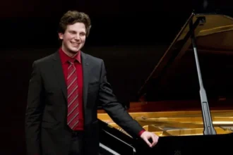 Jayson Gillham Loses Gaza Comments Case Against Melbourne Symphony Orchestra Acclaimed British Australian pianist Jayson Gillham has lost his workplace discrimination case against the Melbourne Symphony Orchestra (MSO) over comments he made about the Gaza war during a concert. The Federal Court ruled that the orchestra did not cancel his performance because of his political beliefs. Justice Graeme Hill said the decision was made because MSO wanted to manage possible damage to its reputation and business after the comments. Court Rules MSO Acted Over Reputation Concerns Gillham took legal action against the Melbourne Symphony Orchestra after it cancelled his scheduled recital in August 2024. The cancellation happened shortly after he spoke about the deaths of Palestinian journalists during a Melbourne performance. During the concert, he introduced a five minute piece titled Witness, composed by Connor D'Netto and dedicated to journalists in Gaza. Gillham told the audience that more than 100 Palestinian journalists had been killed since the start of the Israel Gaza war in October 2023. He also accused Israel of carrying out targeted attacks against journalists. He said the killing of journalists was a war crime under international law and argued that such actions prevented the world from seeing evidence of possible war crimes. Judge Says Political Views Were Not the Reason Justice Graeme Hill rejected Gillham's claim that he faced discrimination because of his political views. The judge said the MSO had a policy of avoiding public support for either side in the Israel Gaza conflict. He also noted that classical musicians usually do not make political statements from the stage without approval from the event organiser. According to the ruling, the orchestra cancelled the recital because it believed the comments could negatively affect its public image and operations. Orchestra Later Called Cancellation an Error The MSO received three complaints following Gillham's remarks and decided to cancel his upcoming recital on 15 August 2024. The decision caused a strong public reaction, with almost 500 complaints being submitted against the cancellation. The orchestra later admitted that cancelling the performance was an error and attempted to arrange a new date for the event. During the trial, MSO argued that its stage was meant for musical performances rather than personal political statements. Gillham's legal team argued that he had the right to express his beliefs and should not face workplace consequences because of them. Gillham Responds After Court Decision Following the judgment, Gillham said he was disappointed and needed time to consider the decision before making further comments. The case lasted three weeks and included evidence from Gillham, MSO executives, and other witnesses. The ruling has renewed discussions about freedom of expression, political statements by artists, and the responsibilities of cultural organisations.
